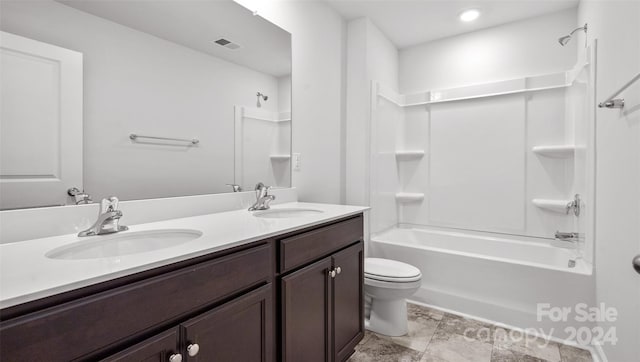 full bathroom with double vanity, tub / shower combination, toilet, and tile floors