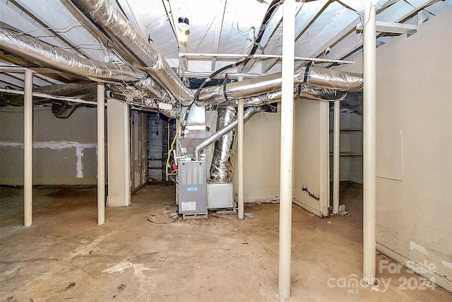 basement featuring heating unit