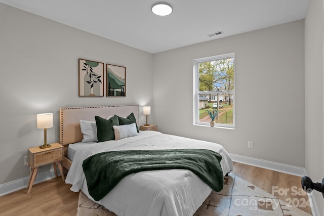 bedroom featuring light wood-type flooring