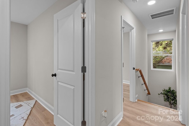 hallway featuring light hardwood / wood-style floors