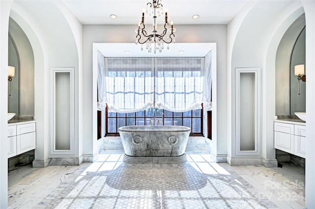 bathroom with vanity, tile flooring, and a chandelier