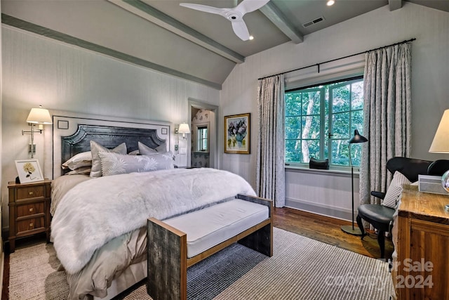 bedroom featuring ceiling fan, vaulted ceiling with beams, and dark hardwood / wood-style flooring