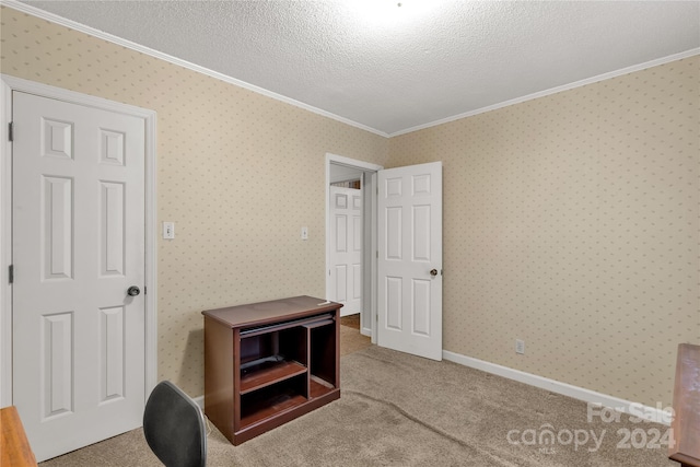 interior space featuring a textured ceiling, light colored carpet, and ornamental molding