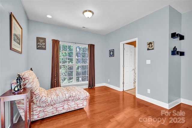 living area featuring hardwood / wood-style flooring