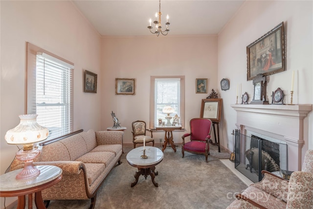 carpeted living room with a wealth of natural light and a chandelier