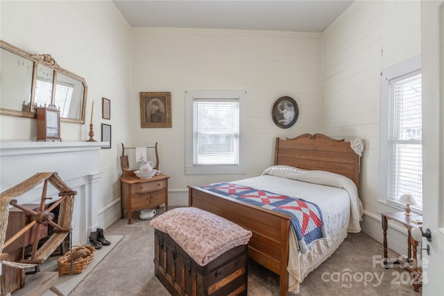 bedroom with light colored carpet