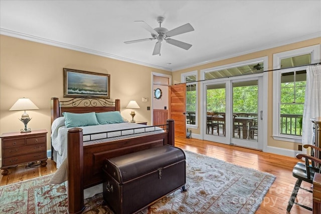 bedroom featuring crown molding, ceiling fan, access to outside, and light hardwood / wood-style flooring