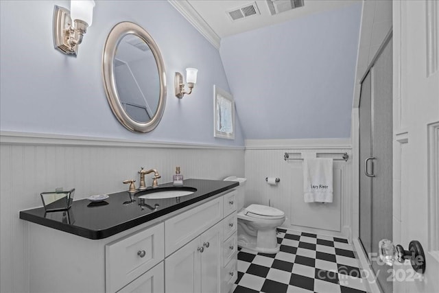 bathroom with toilet, crown molding, an enclosed shower, tile flooring, and vanity