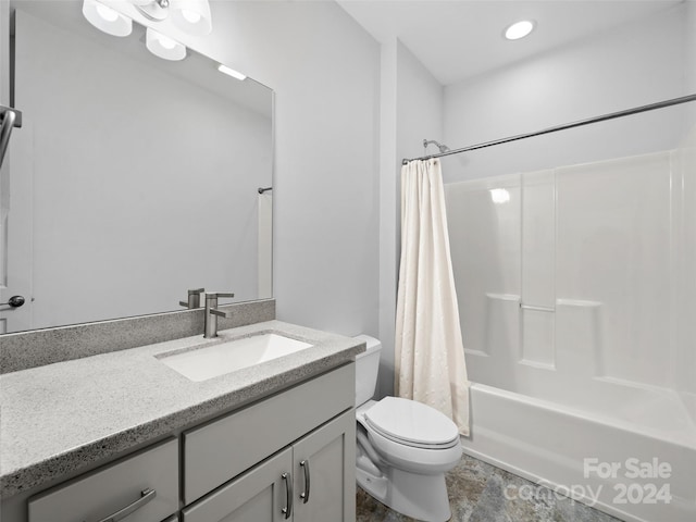 full bathroom with toilet, shower / bath combo, tile floors, and vanity