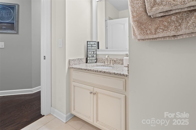 bathroom with vanity and tile patterned floors