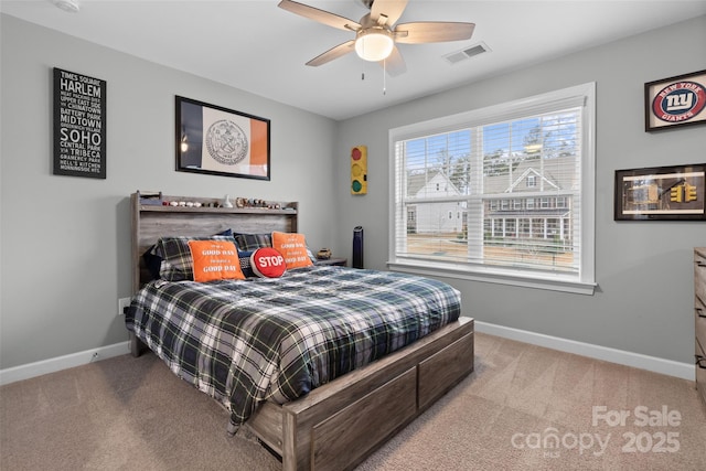 carpeted bedroom featuring ceiling fan