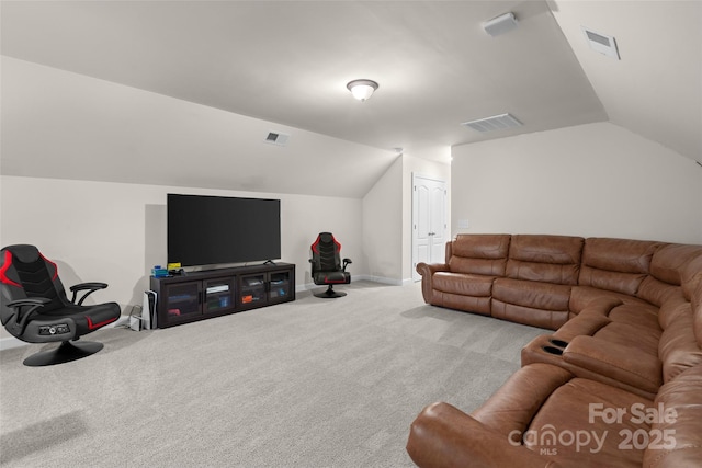 carpeted living room with lofted ceiling