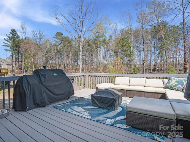 wooden deck featuring an outdoor hangout area