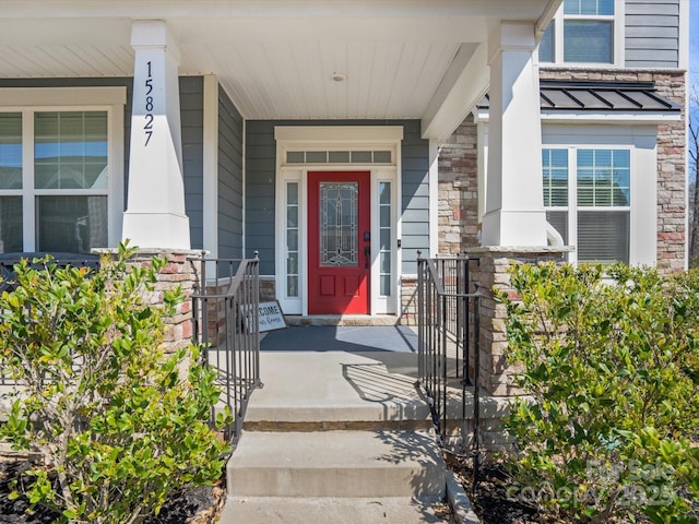 entrance to property with a porch