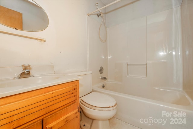 full bathroom with toilet, washtub / shower combination, tile floors, and vanity