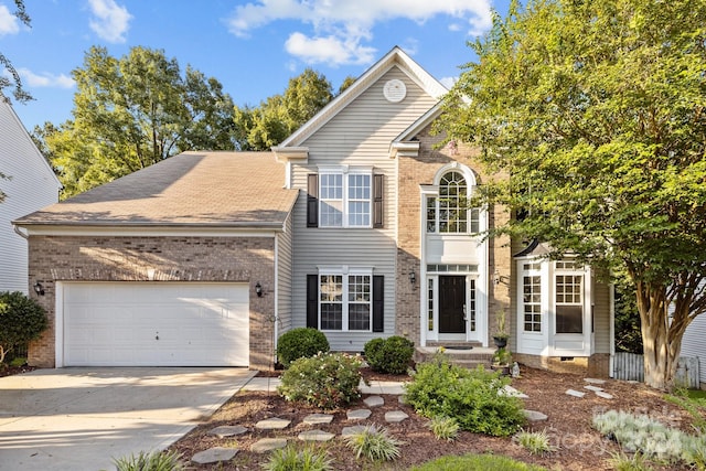 front of property featuring a garage