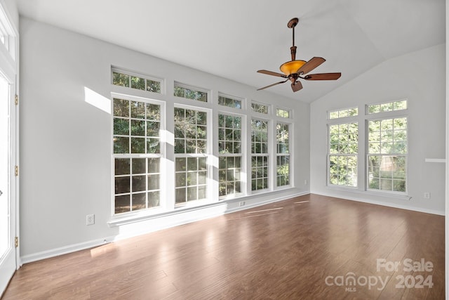 unfurnished sunroom with lofted ceiling and ceiling fan