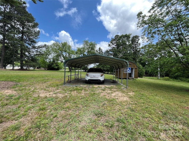 view of yard featuring a carport and a shed