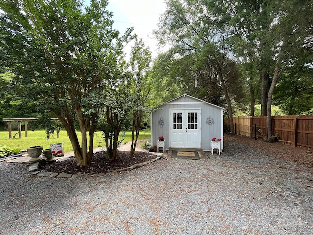 view of outdoor structure featuring a yard