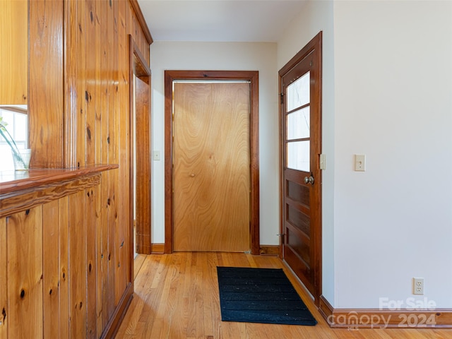 entryway with light hardwood / wood-style flooring