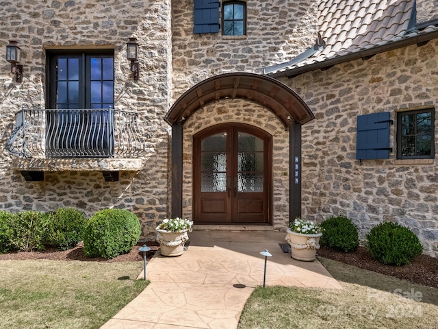 doorway to property featuring french doors