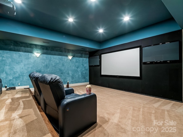 carpeted home theater room with recessed lighting, baseboards, and wallpapered walls