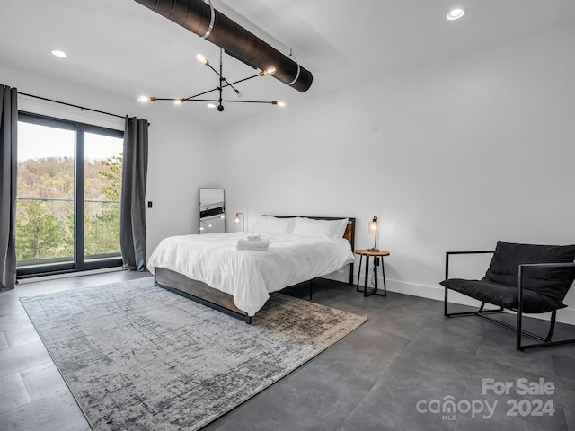 bedroom featuring a chandelier