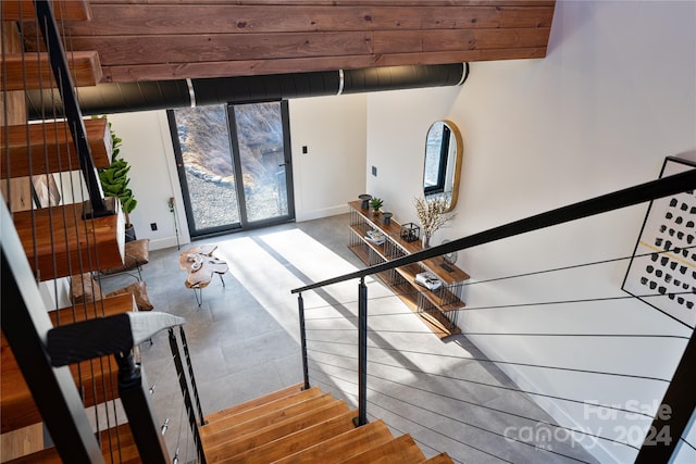 stairs featuring dark hardwood / wood-style floors