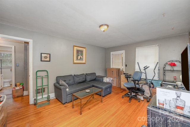 office with light wood-type flooring