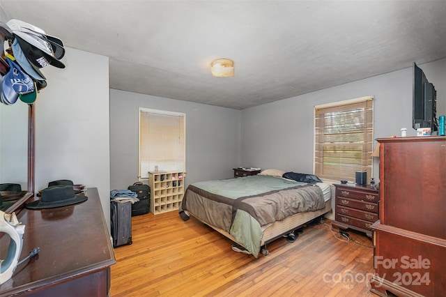 bedroom featuring light hardwood / wood-style floors