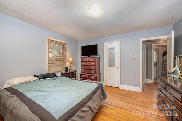 bedroom featuring light hardwood / wood-style flooring