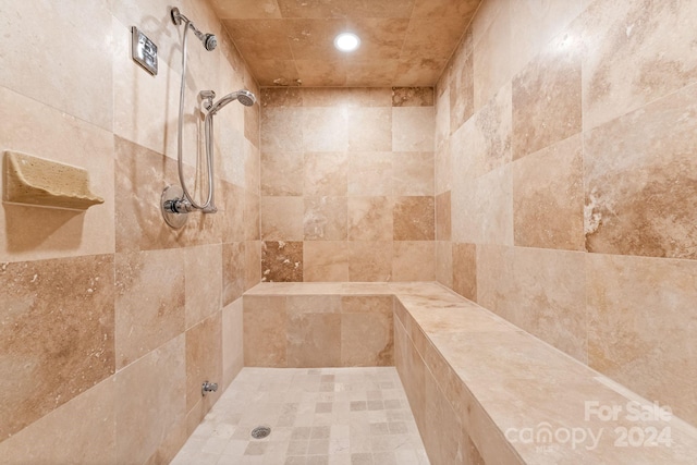 bathroom featuring tiled shower