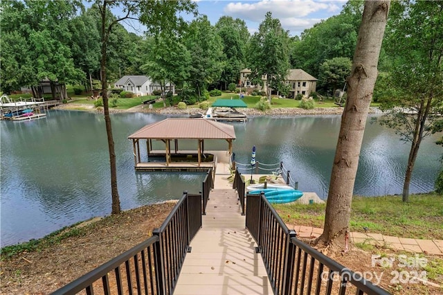 dock area featuring a gazebo and a water view