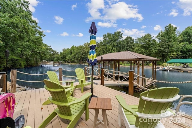 dock area with a gazebo and a water view