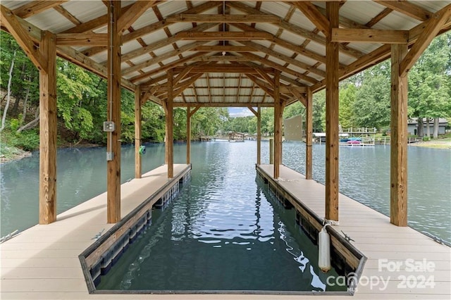 view of dock with a water view