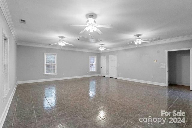 tiled empty room with ornamental molding and ceiling fan