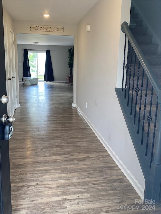 hallway featuring hardwood / wood-style floors