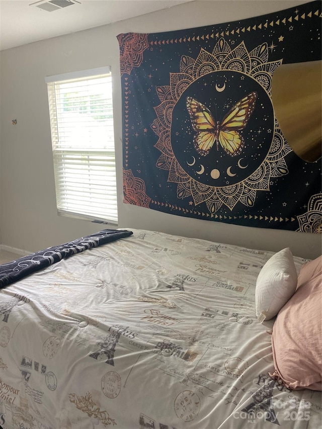 bedroom with visible vents