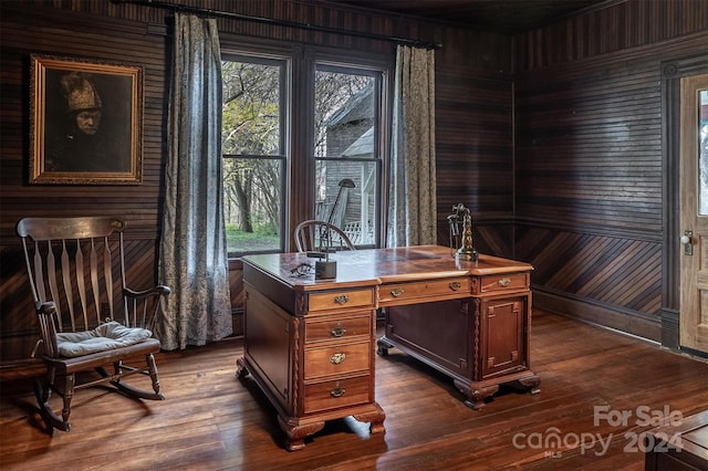 office featuring wood walls and dark wood-type flooring