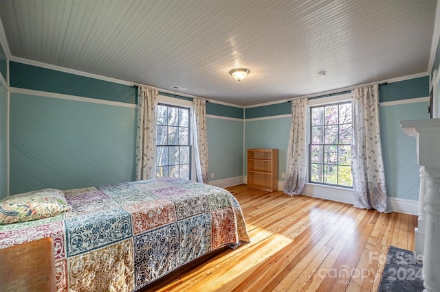 bedroom with light hardwood / wood-style flooring