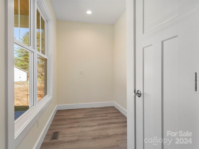 spare room featuring light wood-type flooring