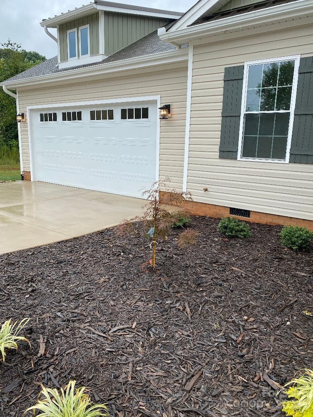 exterior space with a garage