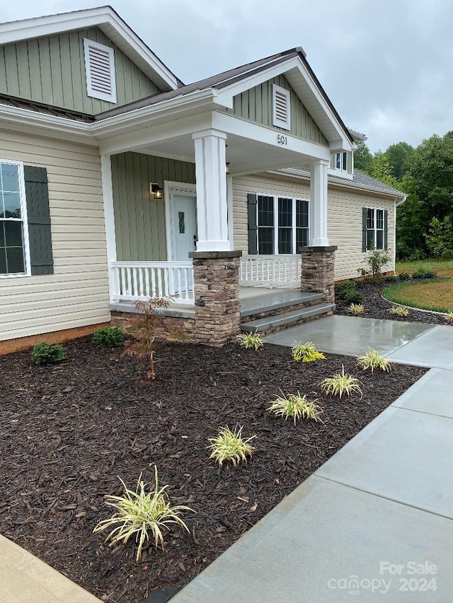 craftsman house featuring covered porch