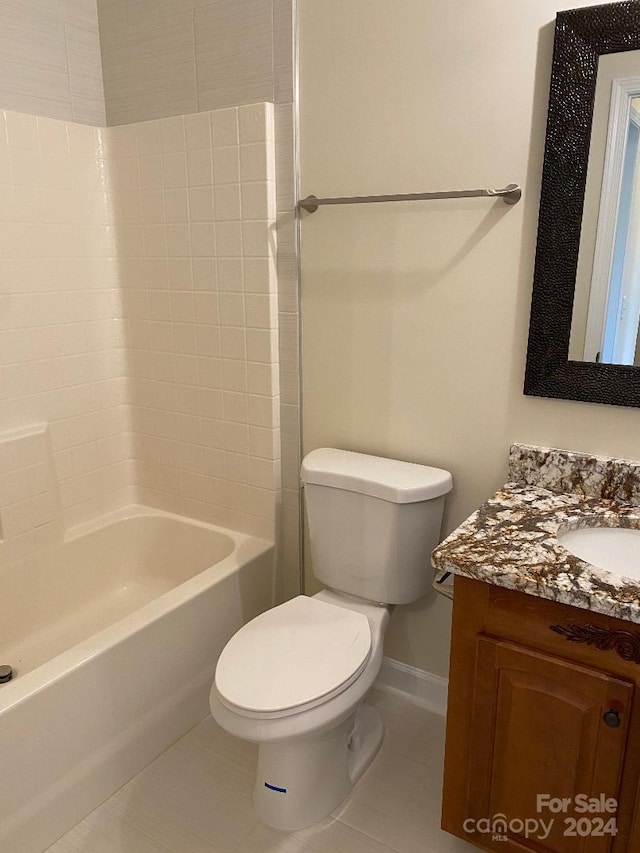 full bathroom with vanity, toilet, tile floors, and bathing tub / shower combination