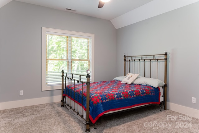 bedroom featuring ceiling fan, carpet, and lofted ceiling