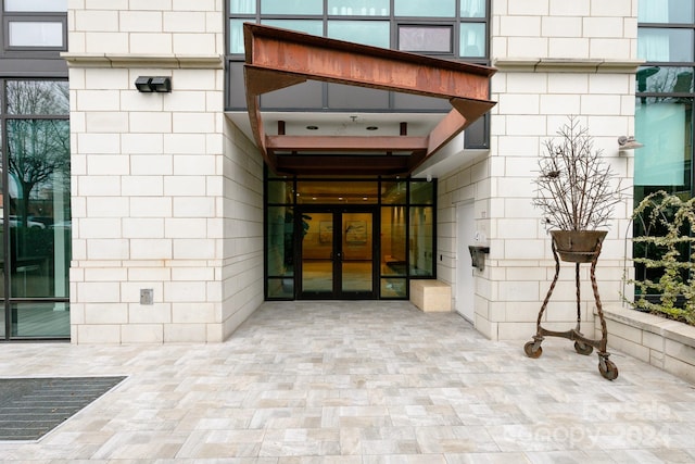 entrance to property featuring french doors