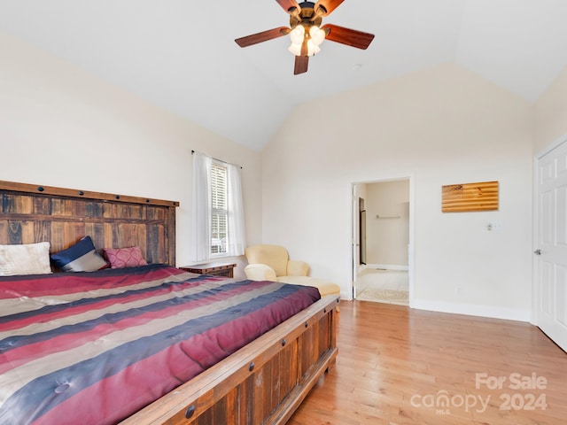 bedroom with light tile flooring, connected bathroom, ceiling fan, and lofted ceiling