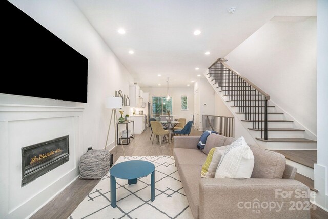 living room with hardwood / wood-style flooring