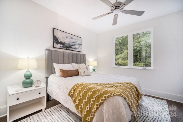 bedroom featuring wood-type flooring and ceiling fan