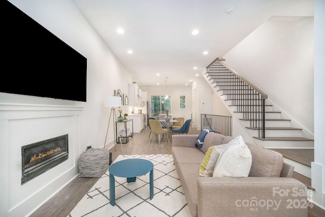 living room with hardwood / wood-style flooring